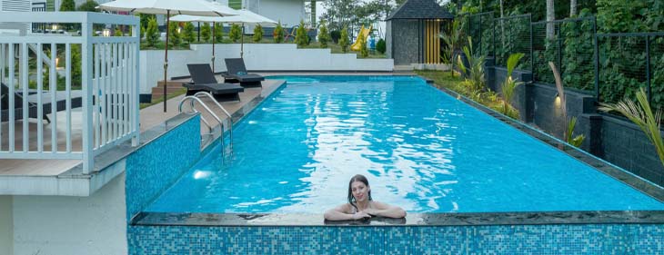 Best Swimming Pool Resort Near Tea Gardens in Munnar